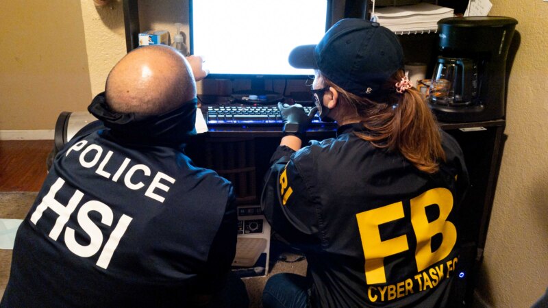 FBI and Homeland Security investigators conduct a search during a Joint Criminal Opioid and Darknet Enforcement (JCODE) operation. Photo: FBI image repository.