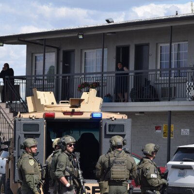 SWAT tactical team operation at night. Image credit: Hagadone News Network; illustrative, not from the Kodak scene.