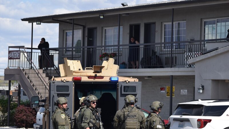 SWAT tactical team operation at night. Image credit: Hagadone News Network; illustrative, not from the Kodak scene.