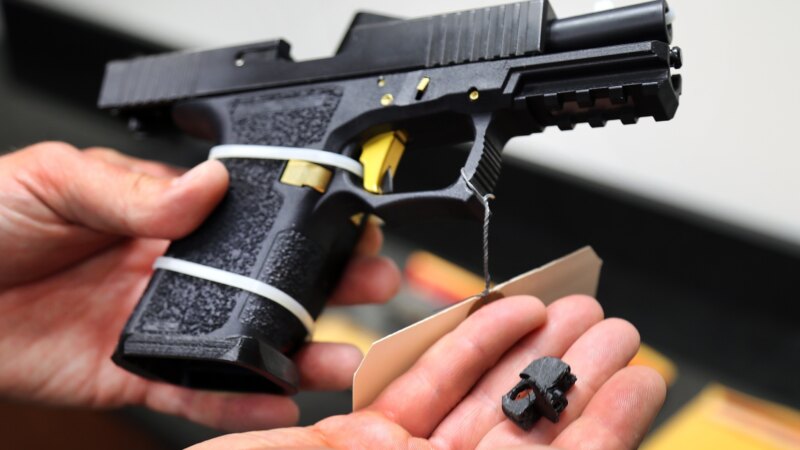 Evidence photo of a seized Glock switch machine gun conversion device held by federal authorities. Image: ABC News/KVNU.
