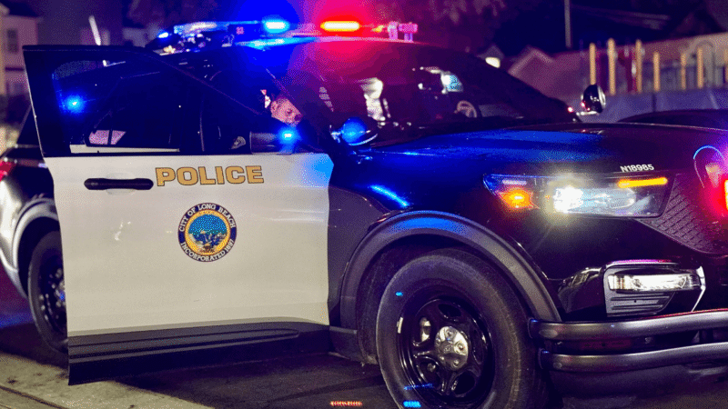 A City of Long Beach police vehicle with lights flashing at night (file photo)