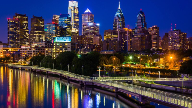 Philadelphia skyline at night. Image via thrillophilia.com.